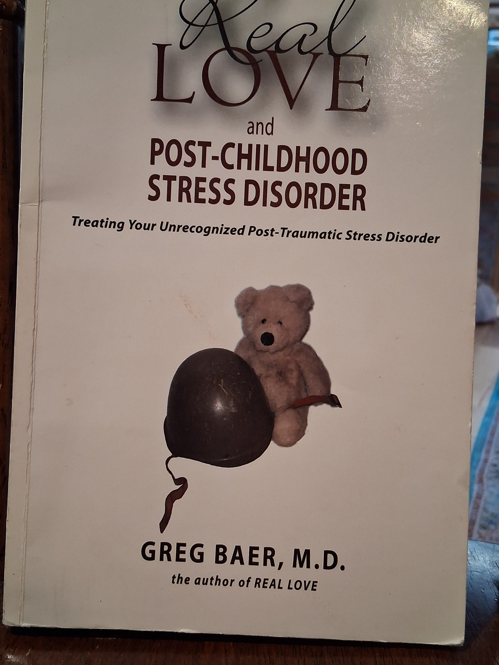 Real Love and Post-Childhood Stress Disorder by Greg Baer - White Cover